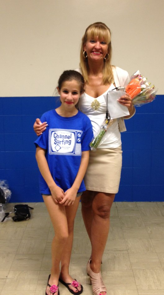 AMA director Ann Marie Frank with student after the June 2013 performance.
