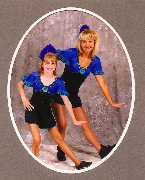 Carolyn as a child and Ann Marie Frank pose in June 1999