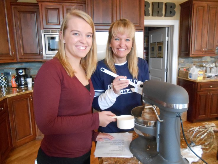 Kendall Frank and her Mom make cookies for the holidays,
