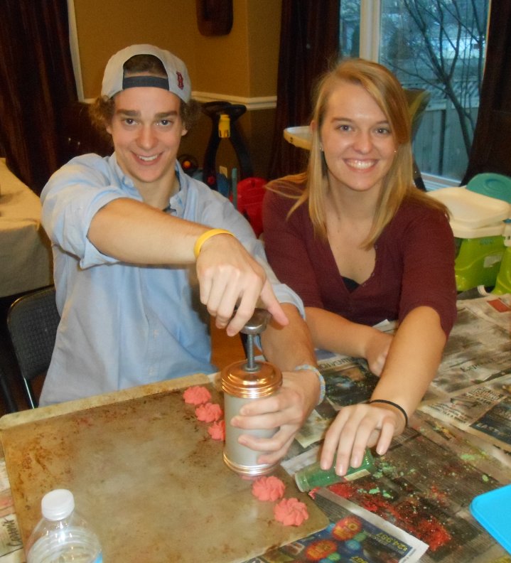 Pressing cookies for the holidays.