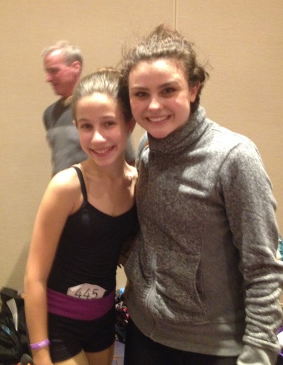 Melanie Moore poses with AMA student at the 2014 JUMP convention.