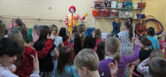 Ronald McDonald talks to students about staying fit.