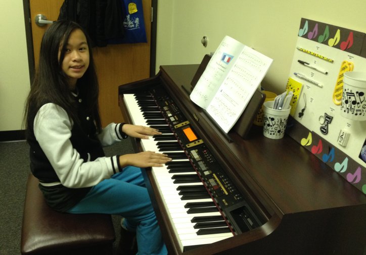 Dian takes music lessons at AMA.