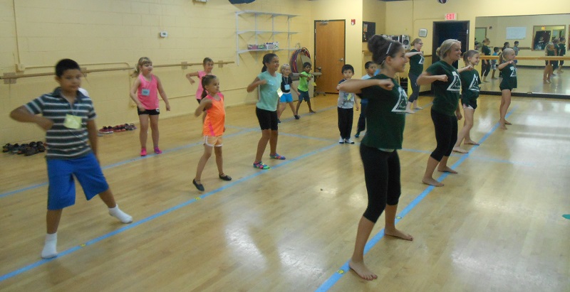 Campers dance during summer camp at AMA in Des Plaines IL
