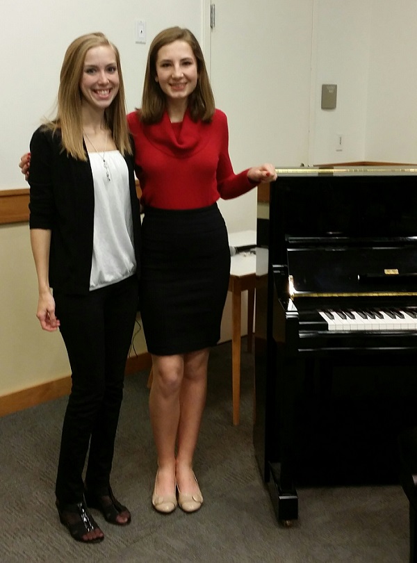 Music teacher Jessica poses with a student at AMA in Des Plaines, IL